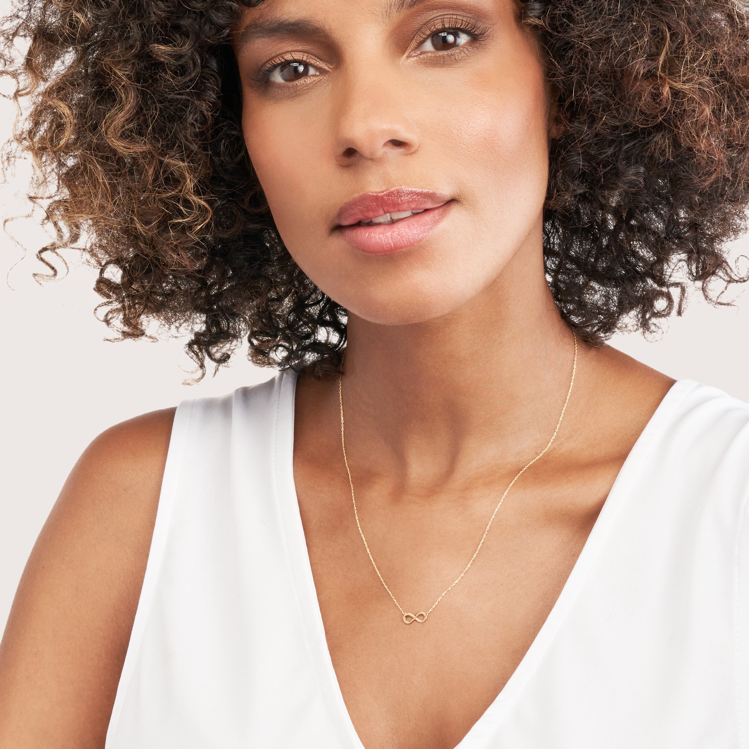 14K gold mini infinity pendant necklace, detail view