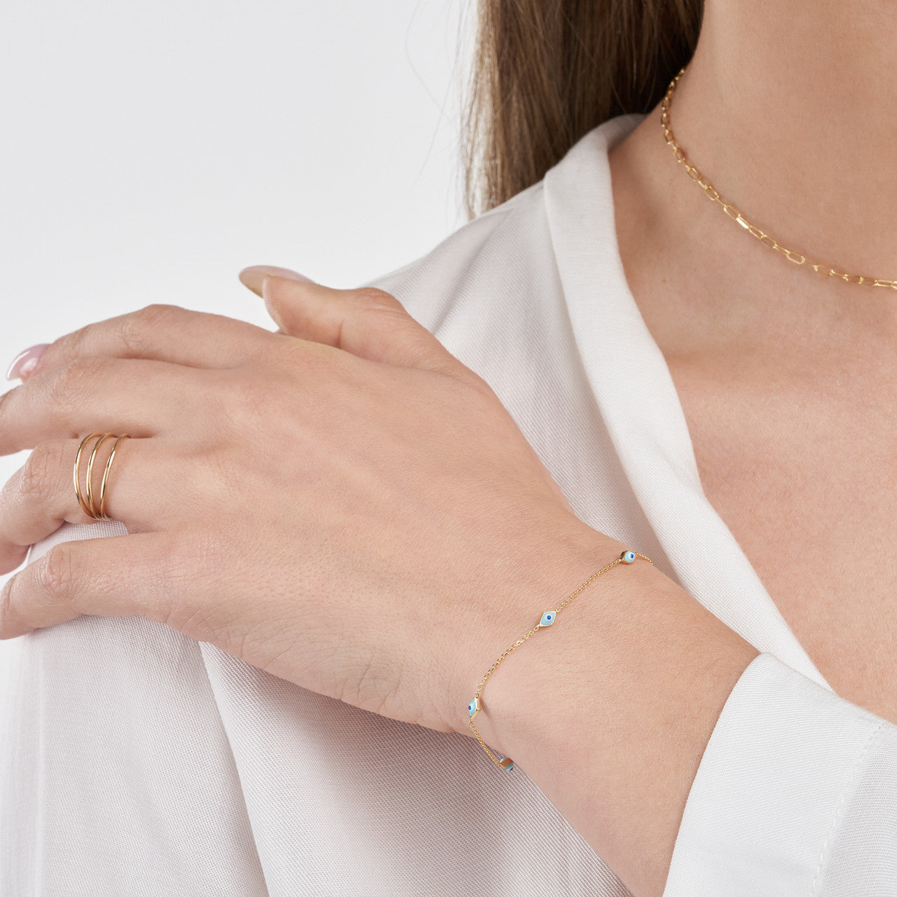 14K gold turquoise enamel evil eye station bracelet, detail view